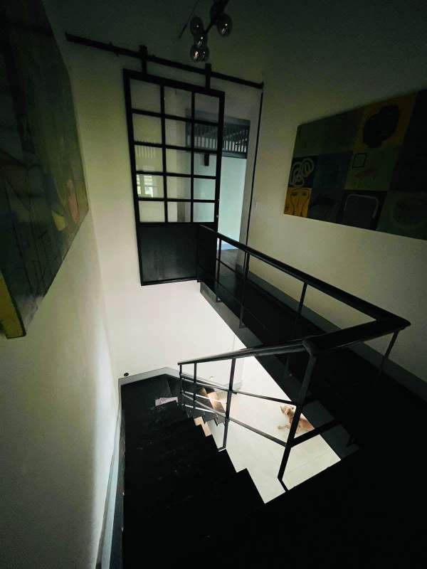 Spacious master bedroom featuring balcony terrace and garden views in luxury Clayton house Panama