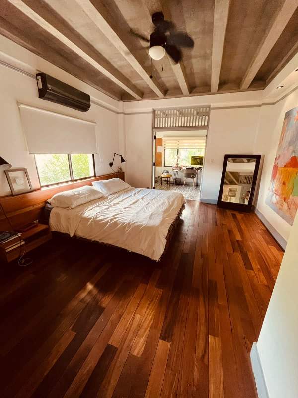 Large covered terrace overlooking lush tropical garden luxury home in Clayton Panama