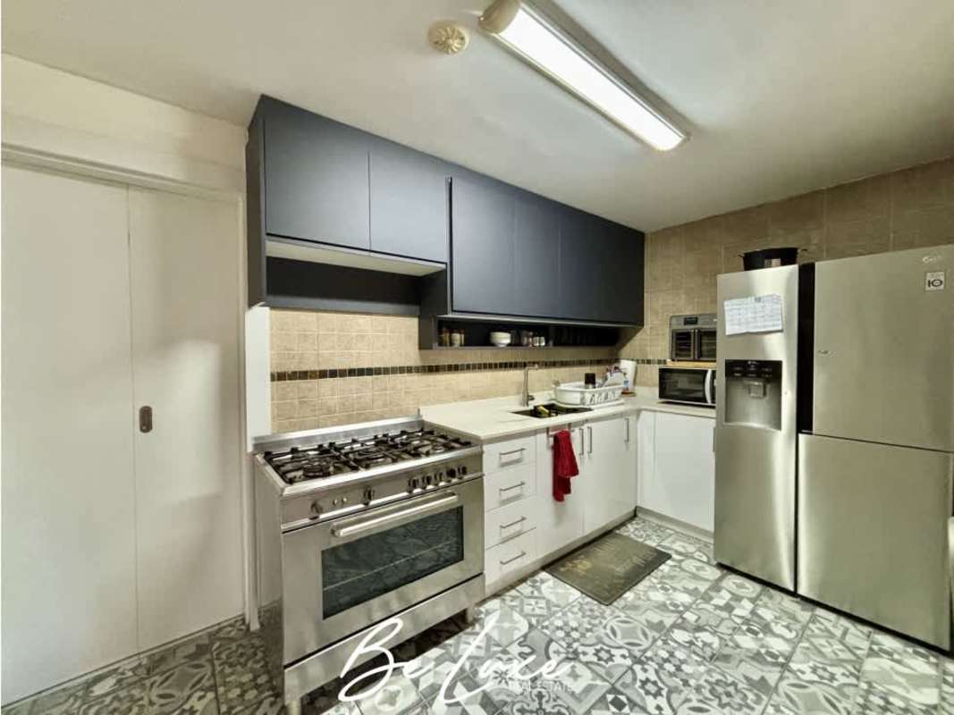 Kitchen with cabinetry and appliances PH Pelican Bay San Francisco Panama City