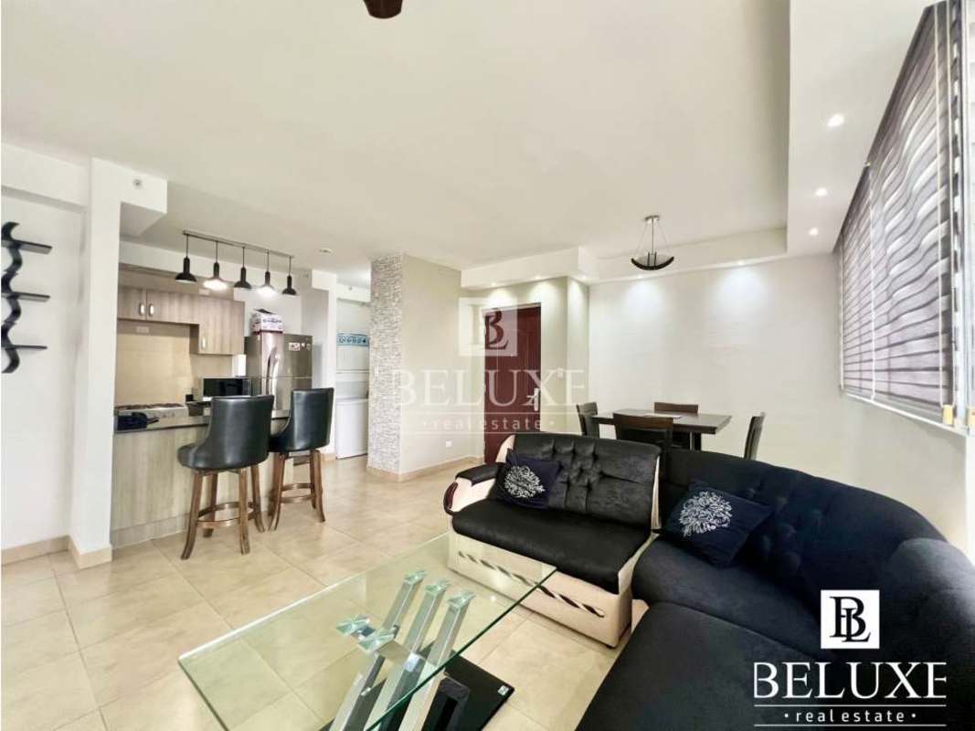 Rooftop pool with panoramic city skyline view PH The One Tower San Francisco