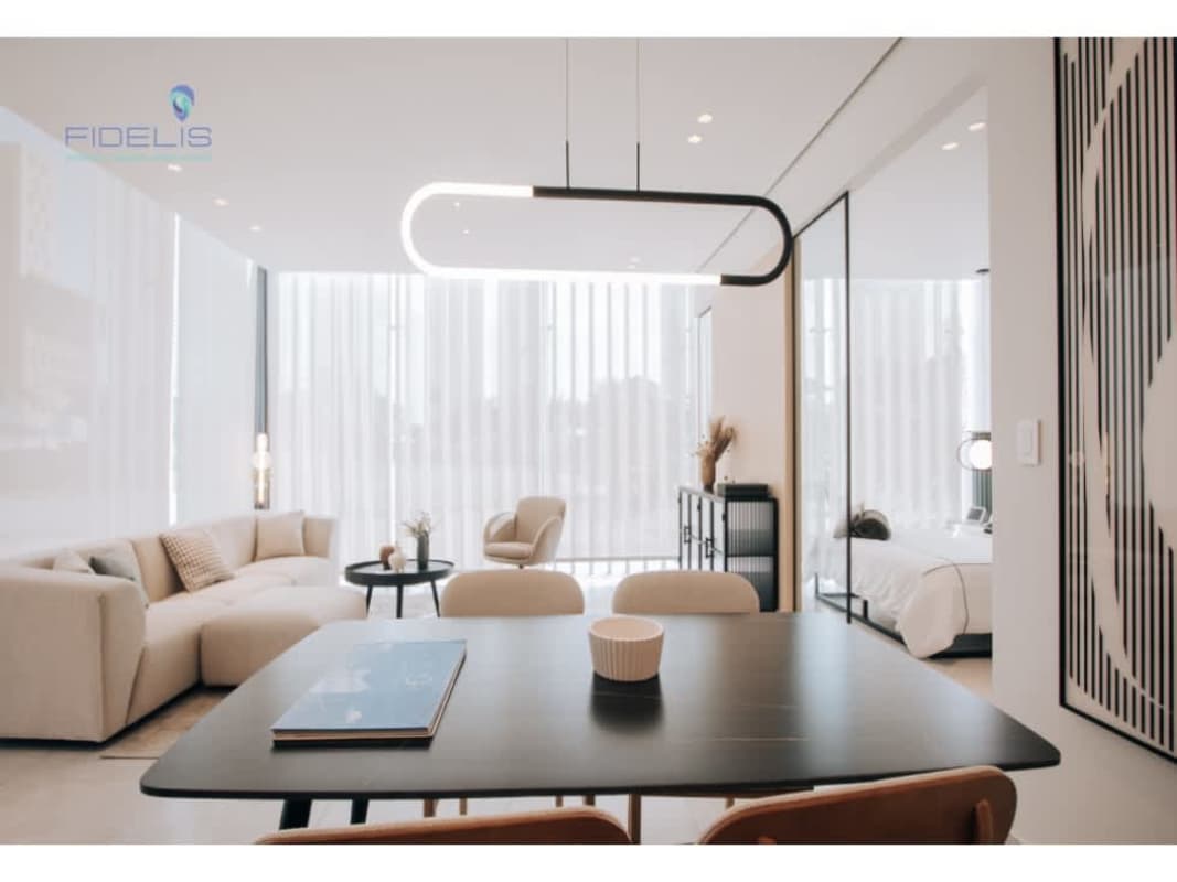 Spacious open-plan living and dining area with minimalist design in Generation Tower Panama