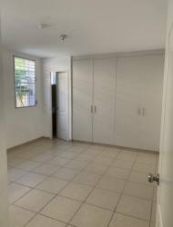 Spacious living dining room with tile floors and garden view in Brisas del Golf Arraiján Panama