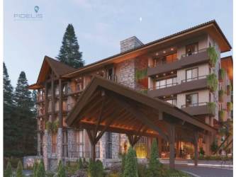 Rustic mountain lodge exterior with wooden architecture stone details and plants at Pinoalto in Boquete Panama