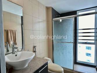 Kitchen with granite countertops and wooden cabinets at PH Terrazas del Farallón Playa Blanca