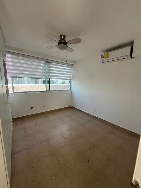 Bright second bedroom with closet, tile floors at Paseo del Golf Carrasquilla Panama City