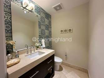 Spacious living room with marble floors opening onto terrace in beachfront condo Puntarenas Buenaventura Panama