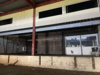 Spacious empty industrial warehouse for sale in Free Zone Colón Panama with high ceilings