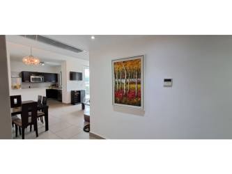 Swimming pool lounge chairs garden area PH Mosaic Panama Pacifico