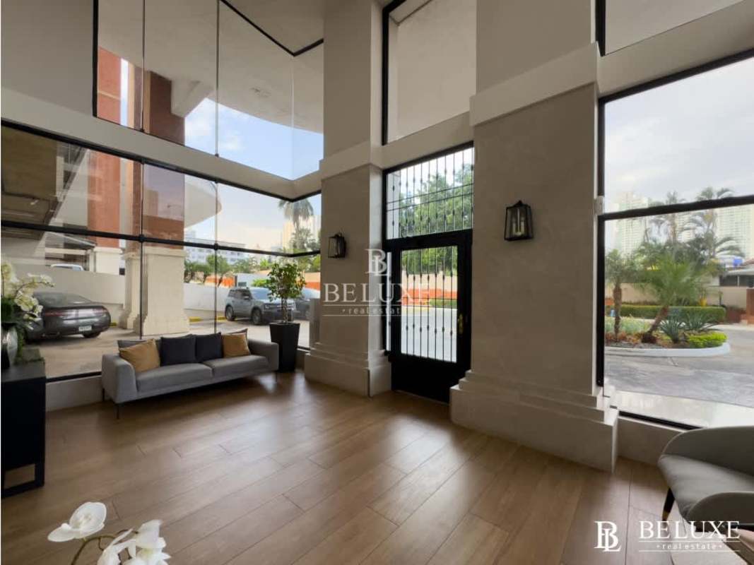 Elegant double-height lobby with lounge seating at PH Country Park Panama City