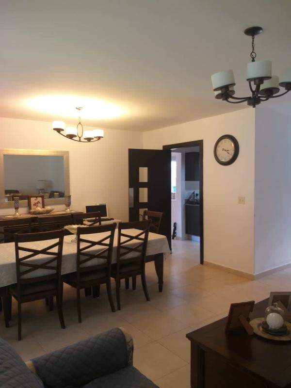 Spacious living room with ceramic floors and comfortable layout in duplex house PH Villa Tiber Panama