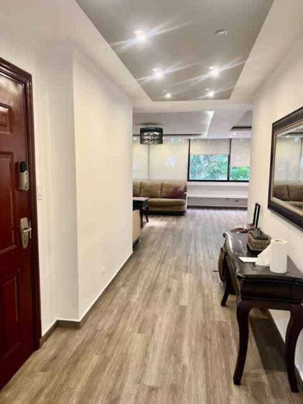 Modern granite countertop kitchen with island and wood cabinets remodeled PH Barlovento Punta Paitilla Panama