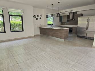 Contemporary kitchen island, fridge, pendant lights PH Nativa Panama Pacifico