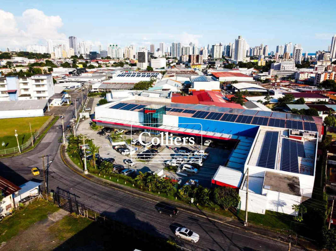 Modern commercial interior with glass partitions, mezzanine, staircase and glossy flooring in Plaza Novey Panama