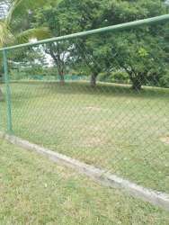 Spacious fenced green lot close to beach resort amenities in Coronado Panama