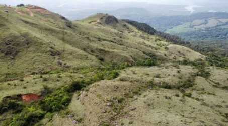 Rolling green hills with mountain slopes and distant Pacific vistas Panama