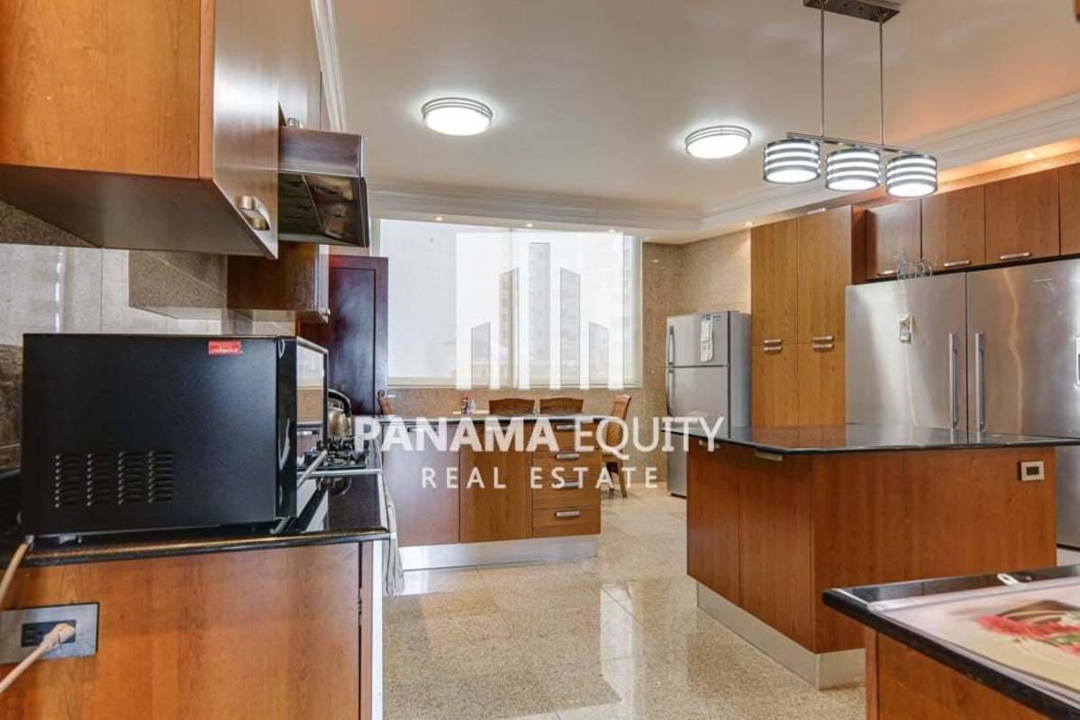 Luxury gourmet kitchen with island, granite countertops, and stainless appliances at Bahia Pacifica Panama