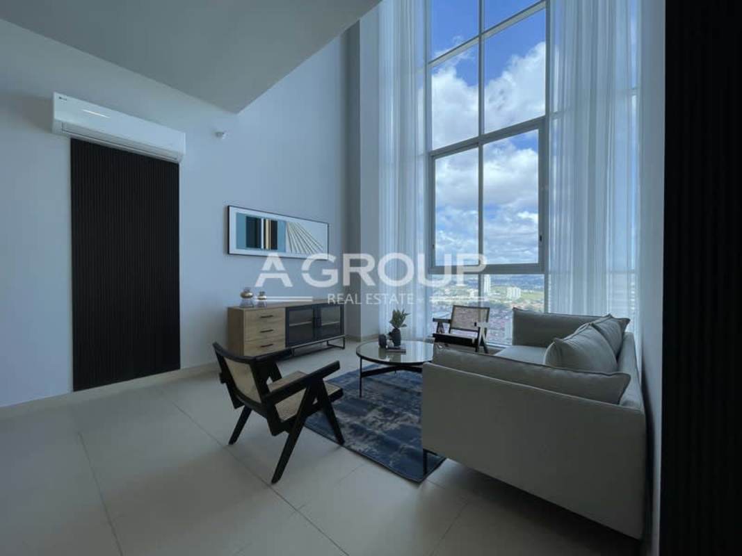 Spacious furnished bedroom with ocean and city view windows PH Country Club Costa del Este Panama
