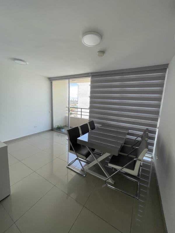 Kitchen with granite counters, appliances, laundry area in PH Sky Park Carrasquilla Panama