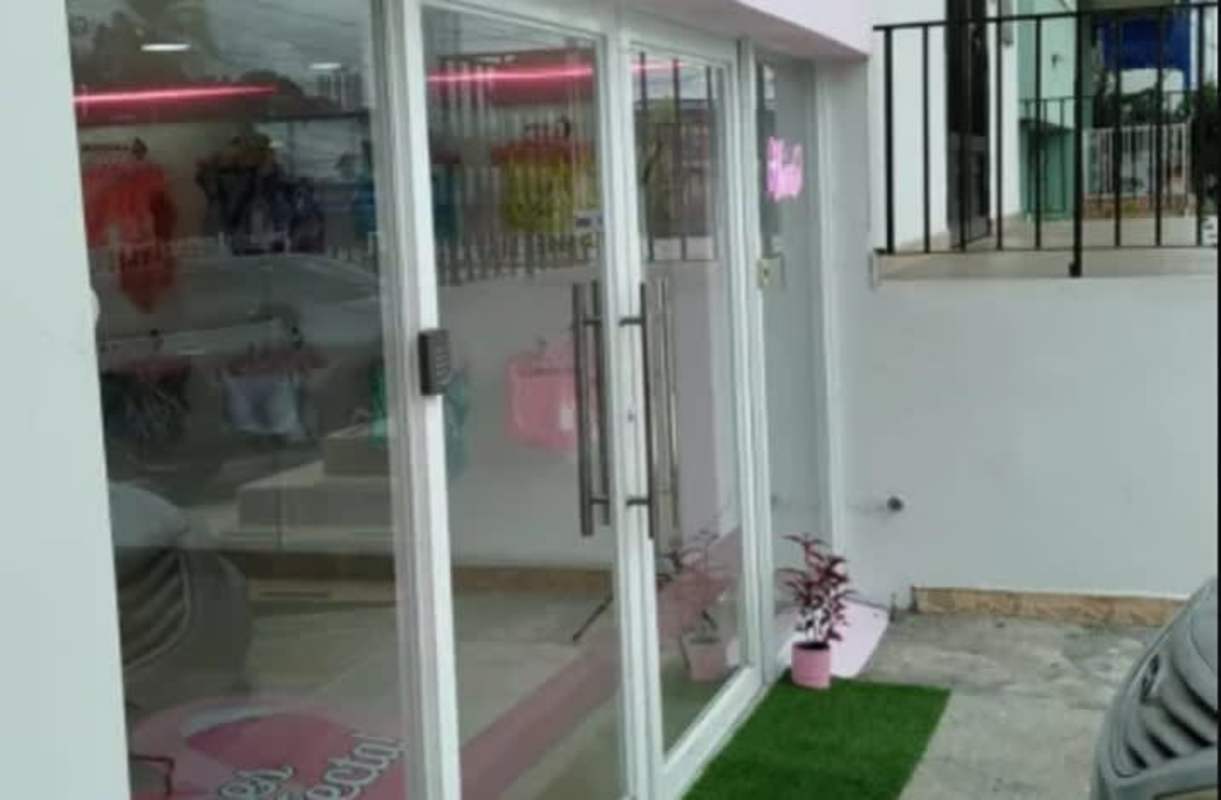 Modern glass door facade of commercial retail space PH Toscana Villa Cáceres Panama