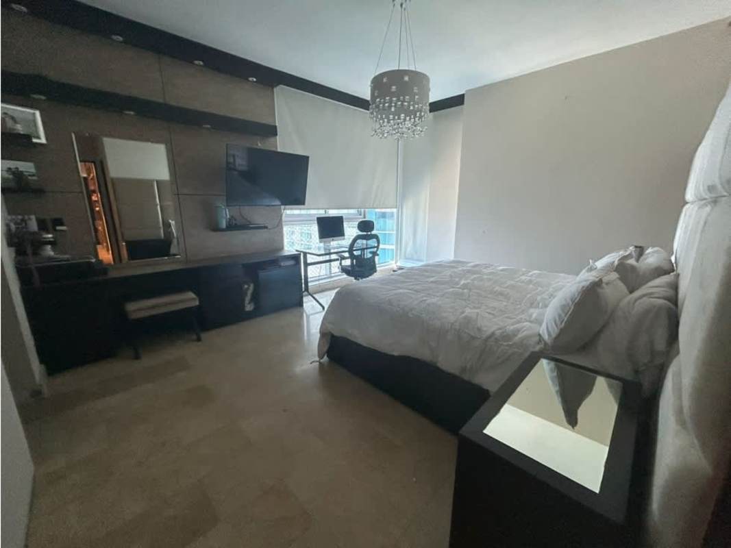 Bedroom with large window city view, built-in closet, air conditioner at PH Pacific Village Punta Pacifica Panama