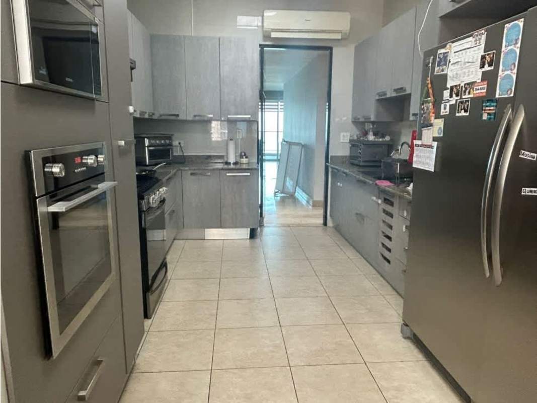 Fully equipped kitchen with granite countertops, stainless steel appliances, in PH Pacific Village Panama