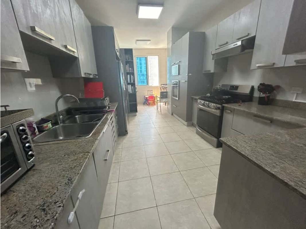 Kitchen with stainless steel appliances granite countertop PH Pacific Village Punta Pacifica Panama