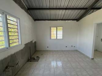 Bedroom with tiled floor in country house for sale Manglarito Sora Panama