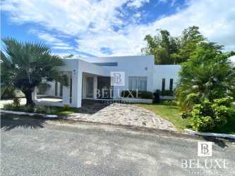 Bedroom with window, ceiling fan and garden view in Ibiza Beach Río Hato