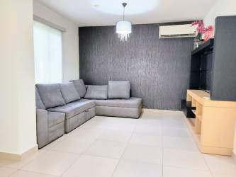 Covered outdoor terrace perfect for entertaining overlooking tropical garden