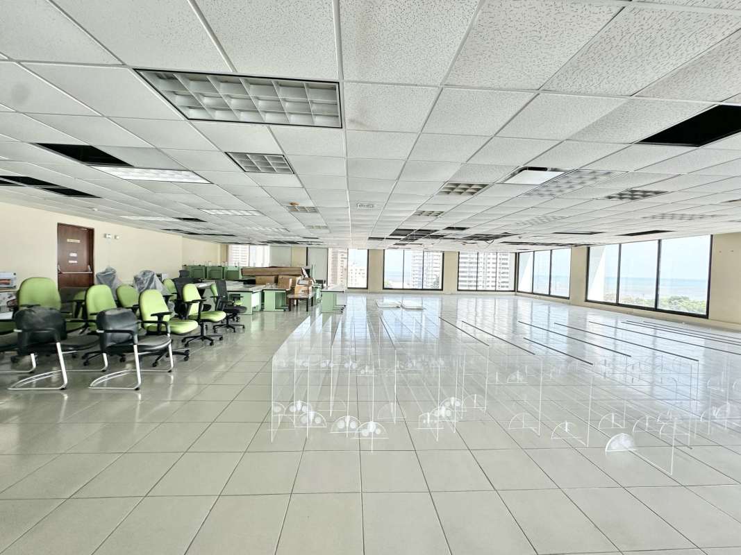 Spacious empty office for rent with tile flooring and floor to ceiling windows Panama City