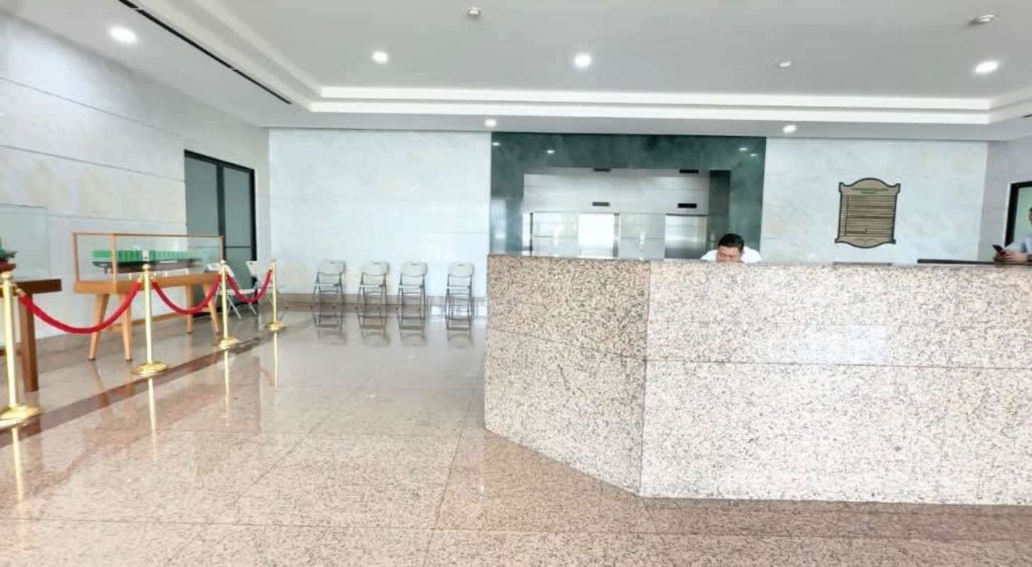 Lobby reception area with granite desk and marble floors PH Pacific Point Plaza Panama City