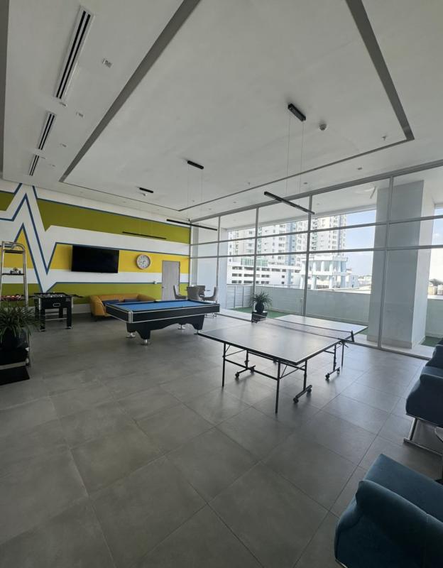 Modern outdoor playground area with city backdrop at PH Vivendi Green Panama