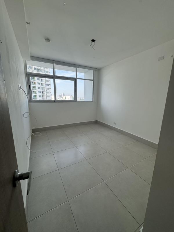 Bright bedroom with ceramic floors and large window PH Vivendi Green Panama
