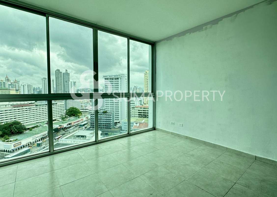 Bedroom in PH Seawaves featuring built-in wardrobe and tile floor in Bella Vista