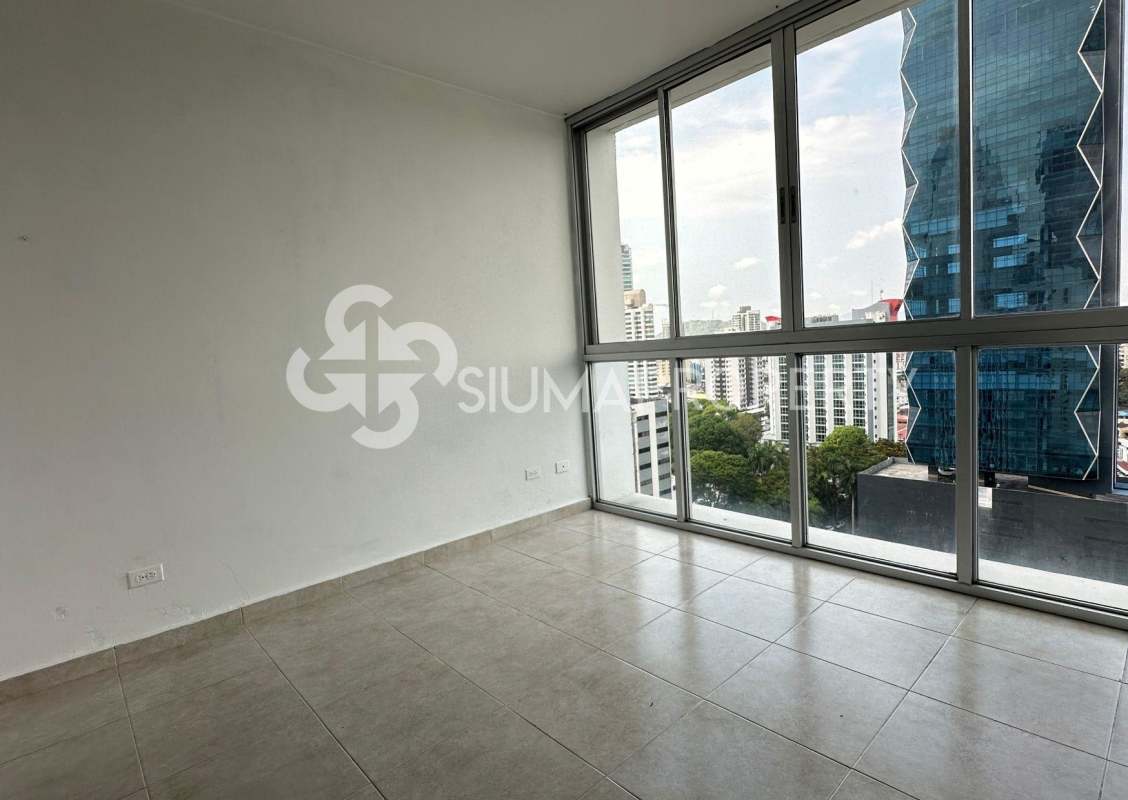 Apartment closed kitchen with grey cabinets and granite countertop in PH Seawaves Tower