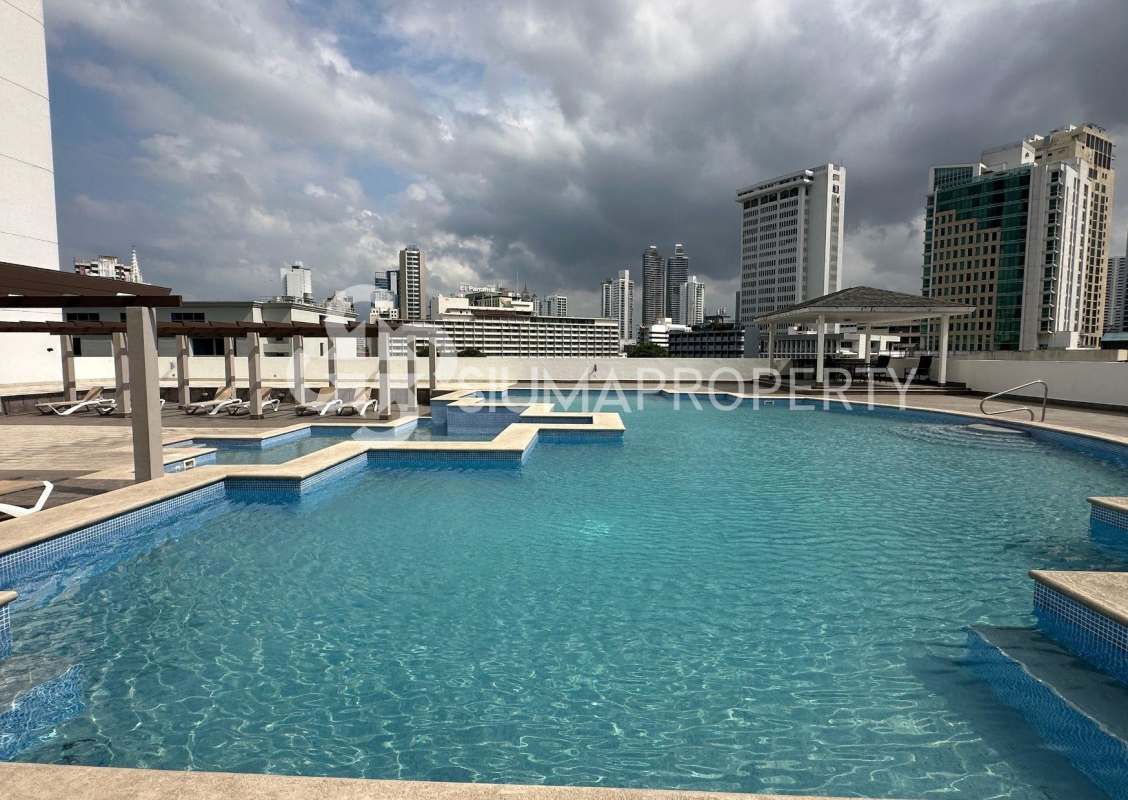 Luxurious rooftop infinity pool lounge at PH Seawaves with skyline view