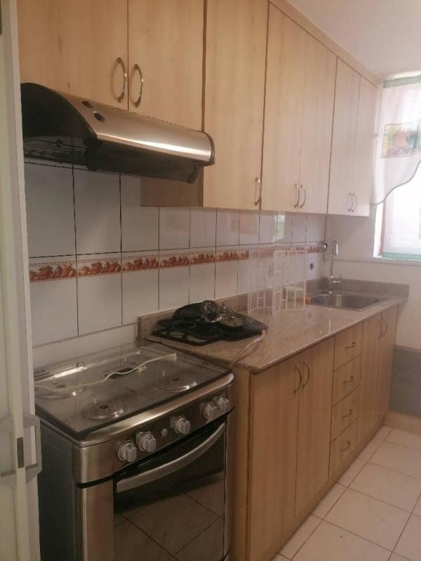 Bright living dining room with stone bar counter and AC in Parque del Este Panama City