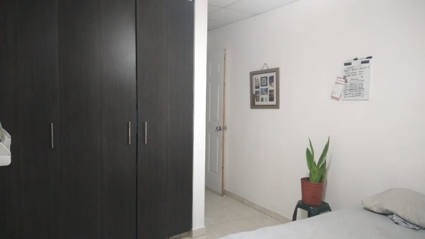 Basic functional apartment kitchen with tile countertops stove and sink PH 19th Road Panama