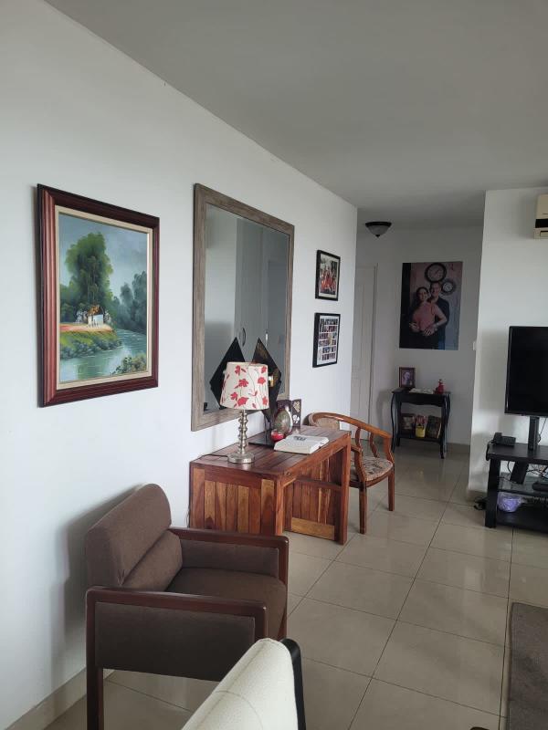 Living room with balcony access city night lights PH Creta Chanis Panama for sale