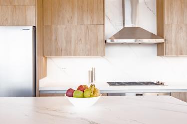 Spacious modern bathroom with glass shower enclosure, marble finishes Pedasi Panama
