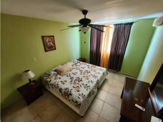 Traditional bathroom with glass shower, decorative tiles in Los Balcones Playa Blanca Panama