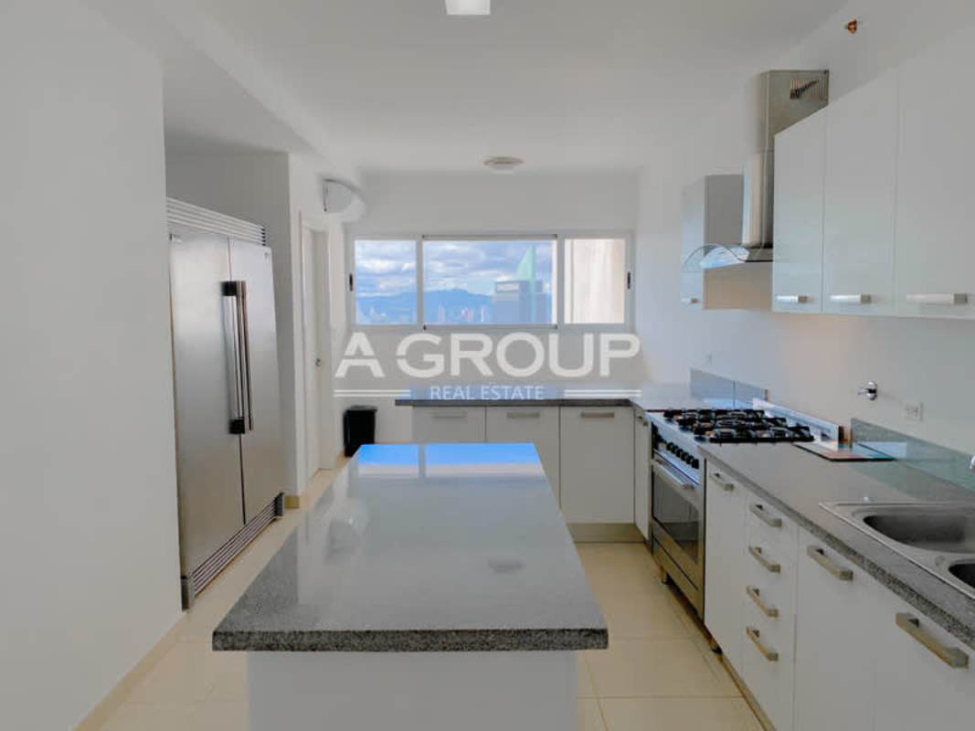 Large ocean front balcony with seating and panoramic views in Waters on the Bay Avenida Balboa