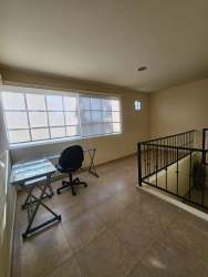 Private tropical backyard with swimming pool at golf course villa in Coronado