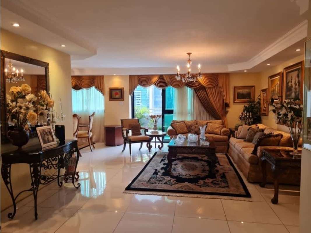 Living area with sofas, paintings, decorative touches PH Brisas de Marbella Panama