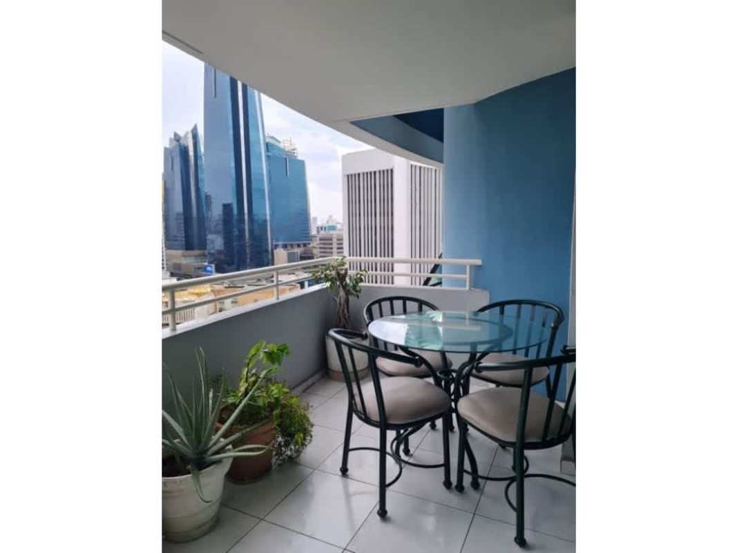 Spacious bedroom with hardwood floor and city view windows Brisas de Marbella Panama