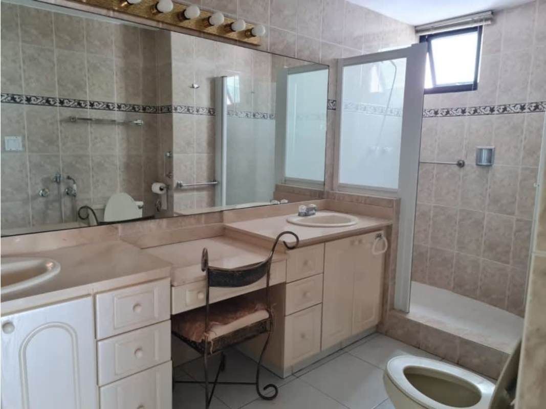 Classic bathroom with large mirror, double sinks, lighting PH Brisas de Marbella Panama