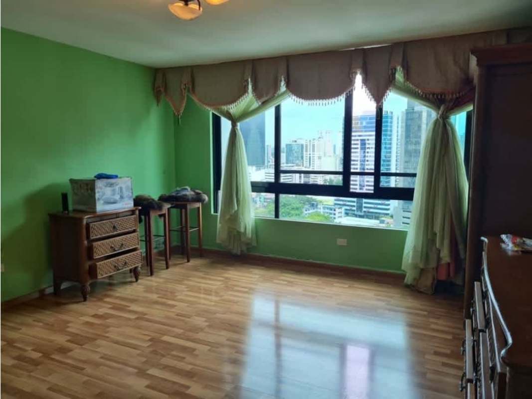 Traditional bedroom with ample windows and hardwood floors Panama apartment