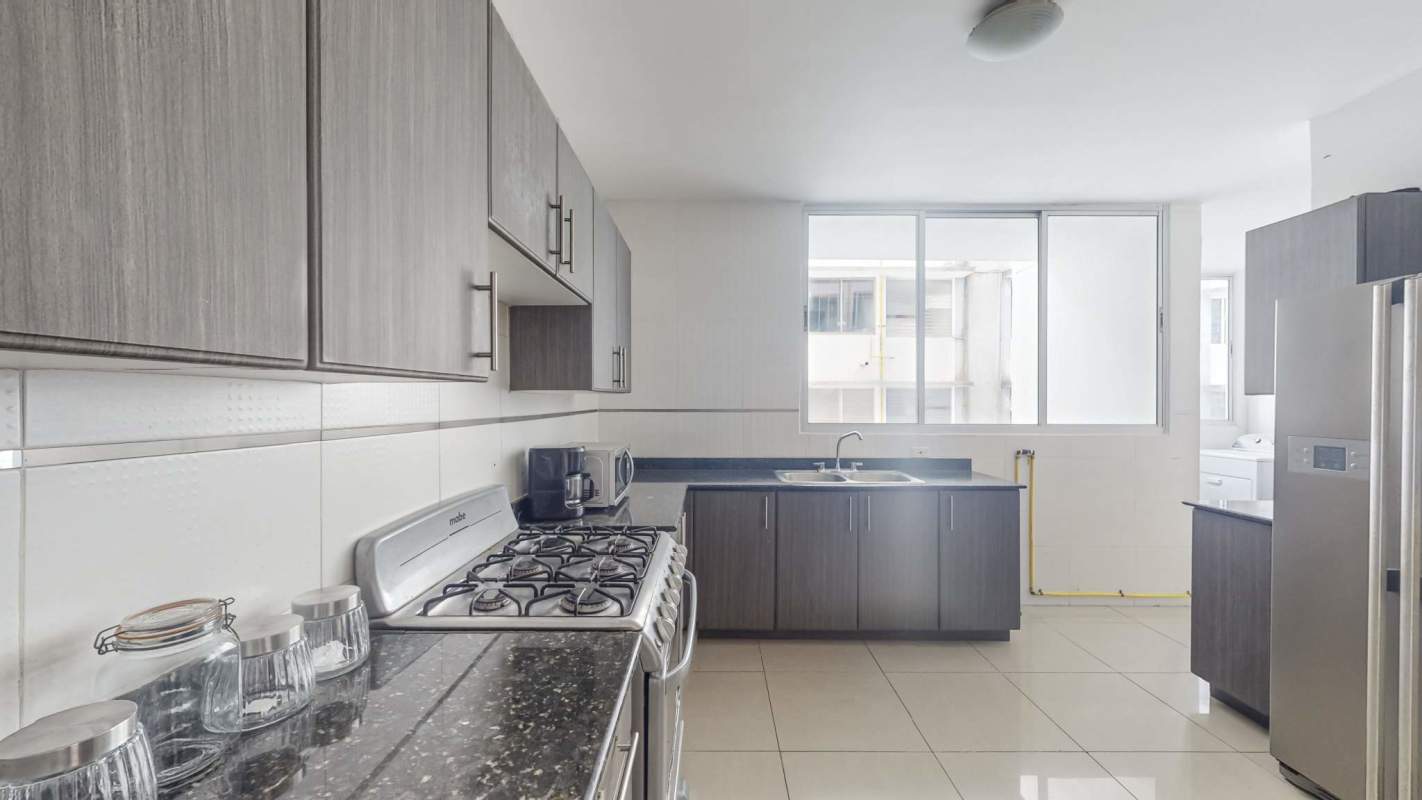 Indoor playground with swings slides colorful flooring at PH The Palm Panama City