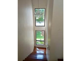 Private outdoor covered terrace and garden with paved area in PH Nativa Panama Pacifico