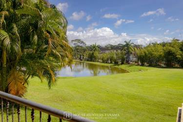 Master bath with marble counters, double sinks and glass shower in Panama